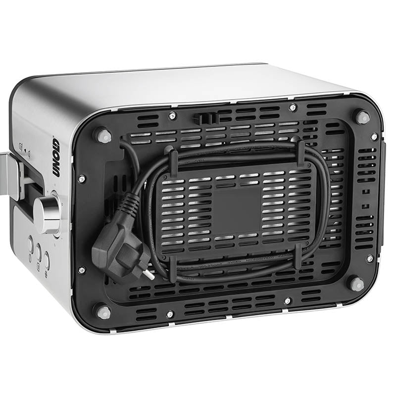 Der Unold Toaster 2 er Kompakt, ein silbernes Küchengerät, ist verkehrt herum abgebildet, das schwarze Netzkabel ist um eine Halterung an der Unterseite gewickelt. Seitliche Bedienknöpfe und Tasten sind sichtbar.