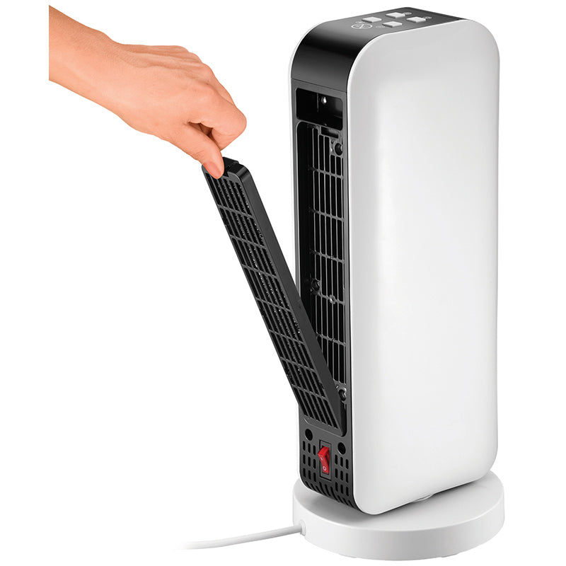 Eine Hand entfernt die vordere Filterplatte von einem weiß-schwarzen Turmventilator von Unold KERAMIK-HEIZLÜFTER DESIGN. Dieser steht auf einem runden Sockel, sein eingestecktes Netzkabel ist unten sichtbar.