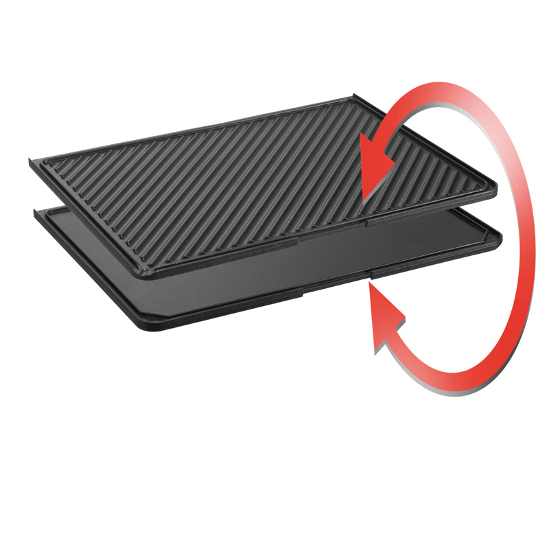 Die Unold Grillplatte für CONTACT-GRILL 8555 ist eine wendbare rechteckige Pfanne mit einer geriffelten Grillseite und einer flachen Grillseite. Ein roter gebogener Pfeil zeigt an, dass sie umgedreht werden kann.