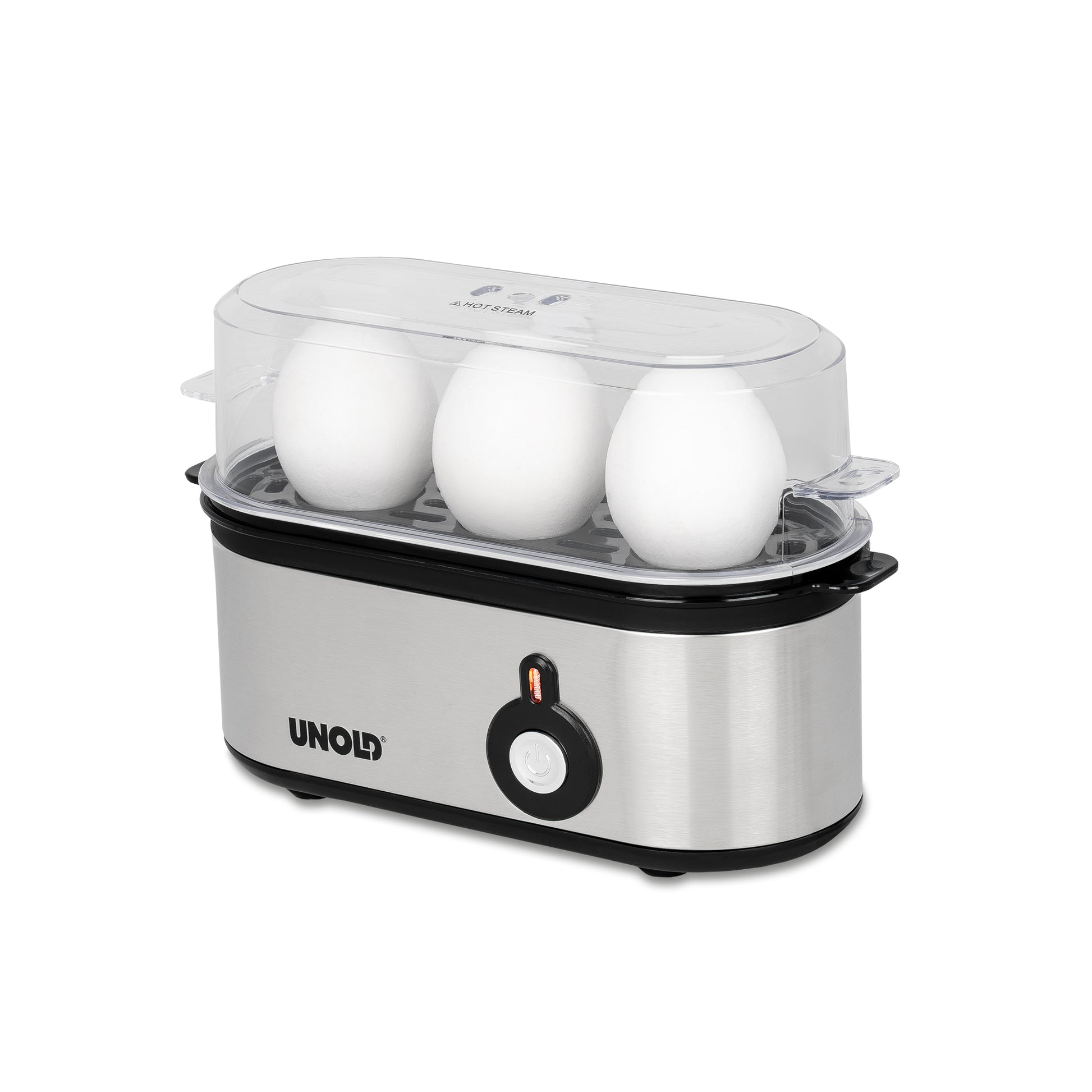 Der Unold Eierkocher Mini aus rostfreiem Stahl mit transparentem Deckel fasst drei weiße Eier. Er verfügt über eine Einschalttaste auf der Vorderseite und eine Kontrollleuchte, die auf weißem Hintergrund angezeigt wird.