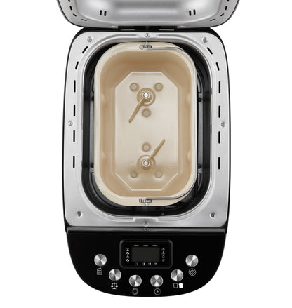 Die Draufsicht des Unold Backmeister® Big Brotbackautomaten zeigt eine leere rechteckige Form mit zwei Knethaken darin. Unten ist das Bedienfeld mit Knöpfen und Display sichtbar.