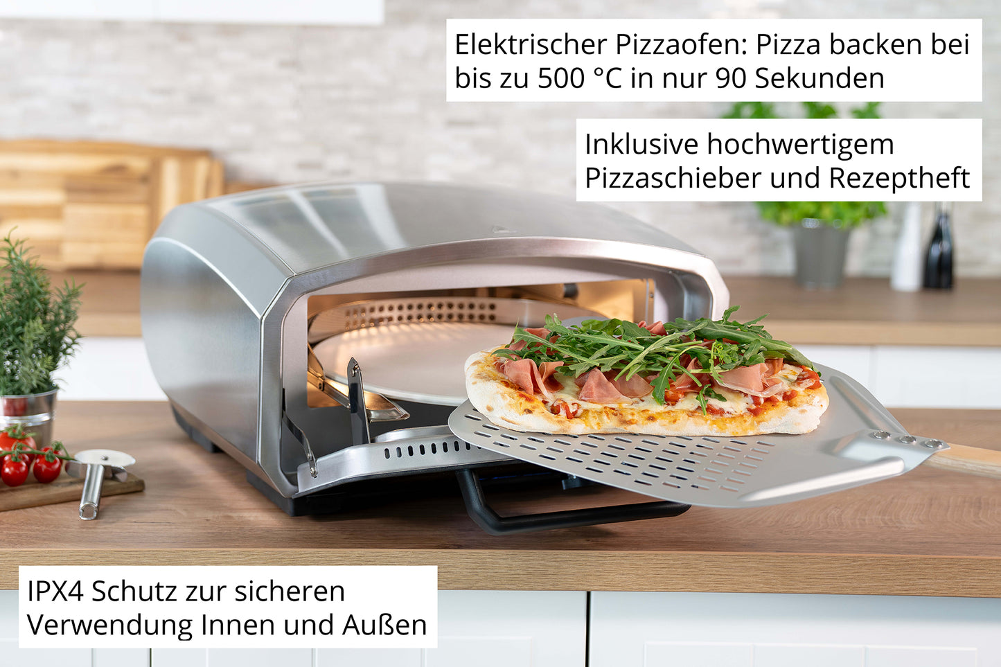 Der Unold Pizzaofen Enzo steht auf einem Küchentisch, während eine Pizza mit Schinken und Rucola herausgezogen wird. Der deutsche Text hebt die hohe Temperatur, die schnellen Backzeiten und das mitgelieferte Zubehör hervor.