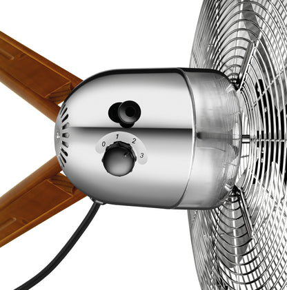Nahaufnahme des Unold STANDVENTILATORS KOLONIAL mit Steuerknopf mit den Einstellungen 0–3, braunen Flügeln, Metallgitter und einem Netzkabel, das aus der Rückseite herausragt.