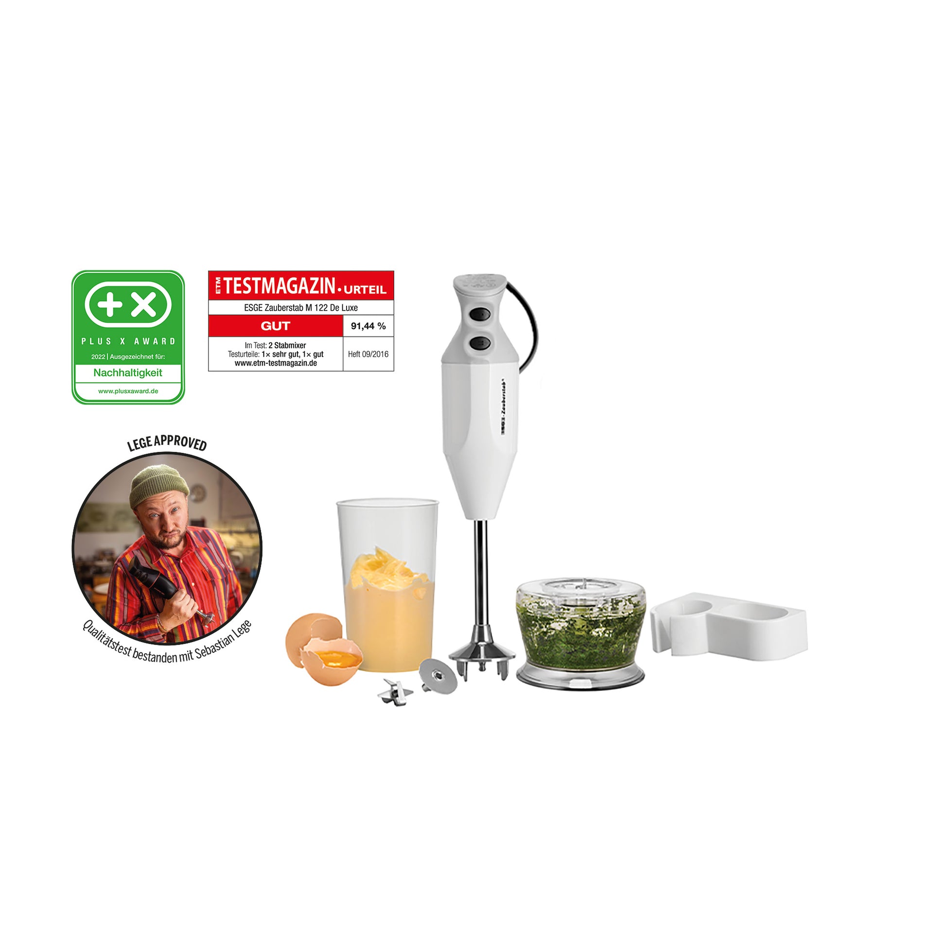 Der Unold ESGE-Zauberstab® M 122 De Luxe Stabmixer mit Aufsätzen, einem Glas Orangensaft, einem aufgeschlagenen Ei, gehackten Kräutern und Plaketten für positive Bewertungen ist auf einem weißen Hintergrund abgebildet.